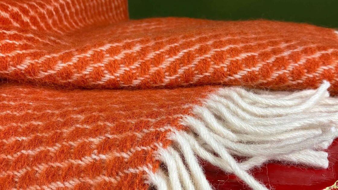 Orange wool blankets and throws