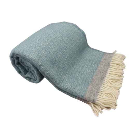 Harald dusty blue eco wool throw rolled up