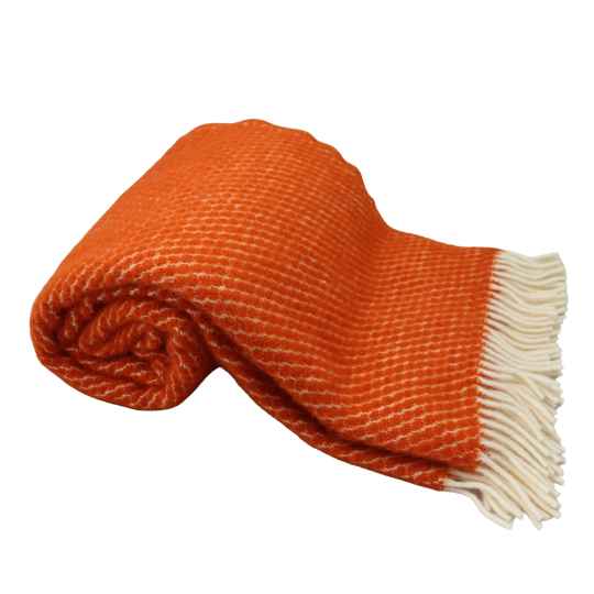 velvet rust orange wool throw rolled up showing pattern