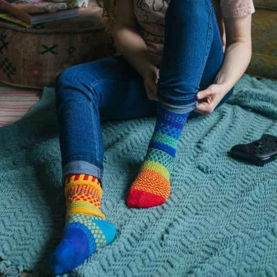 rainbow crew socks being worn