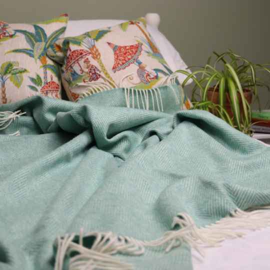 merino wool blanket on a bed