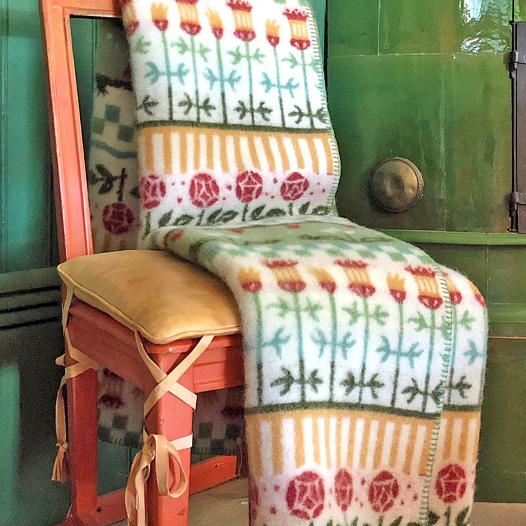 Colourful wool blanket on a chair