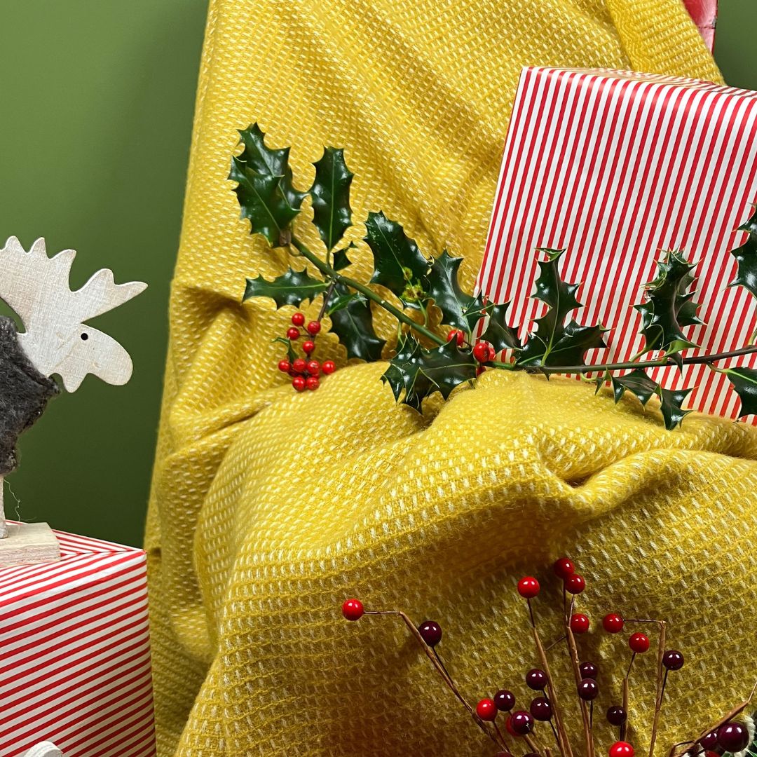 christmas blankets yellow throw on a chair