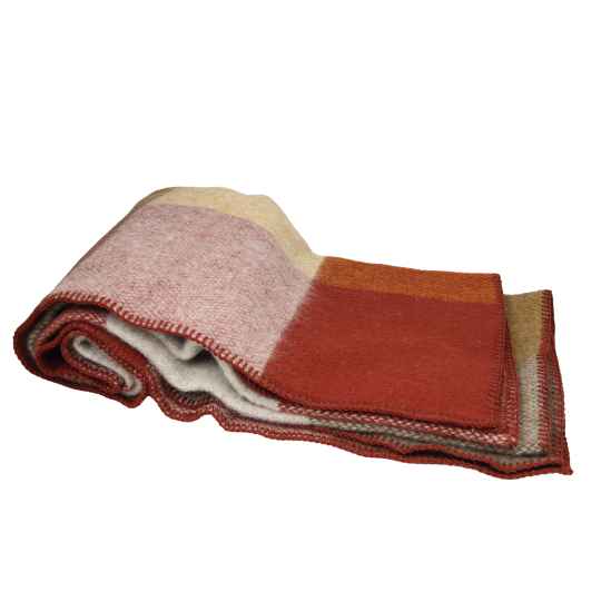 Rust block check blanket with a geometric pattern on a white background