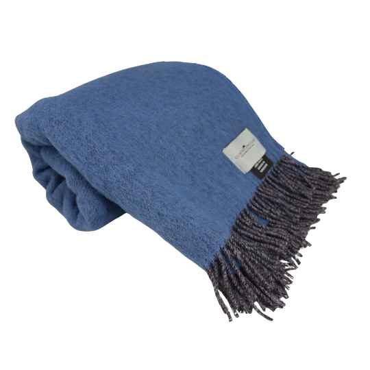 Blue blanket with fringes on a white background