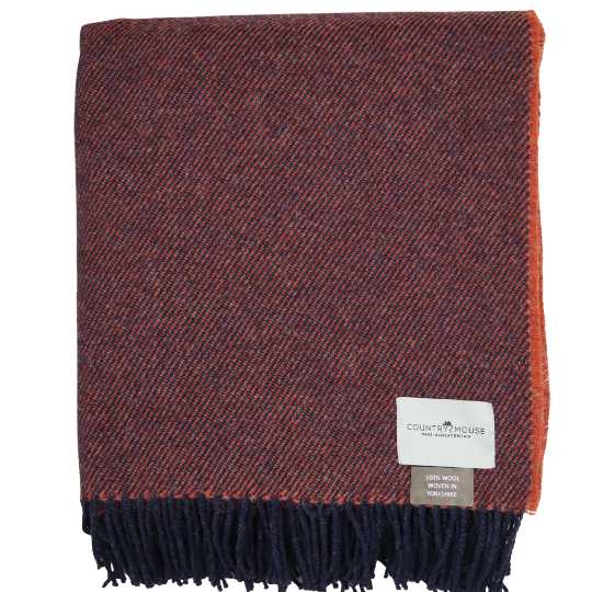 burnt terracotta wool throw on a white background