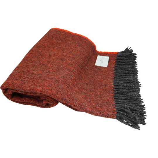 burnt orange wool throw on a white background with grey tassles