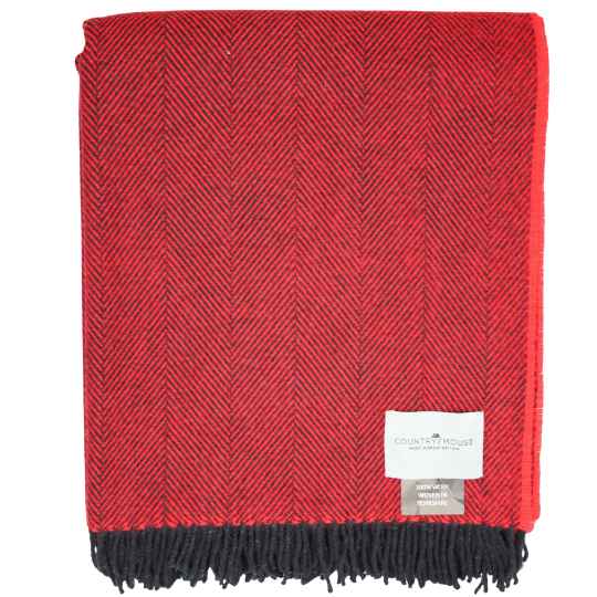 Red herringbone patterned throw blanket with black fringe on a white background