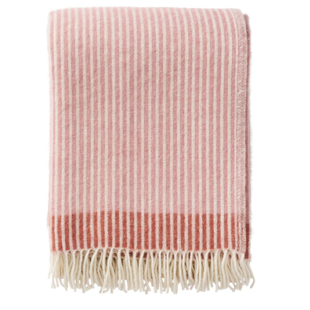 rib dusty pink folded wool throw showing cream stripes on a white background