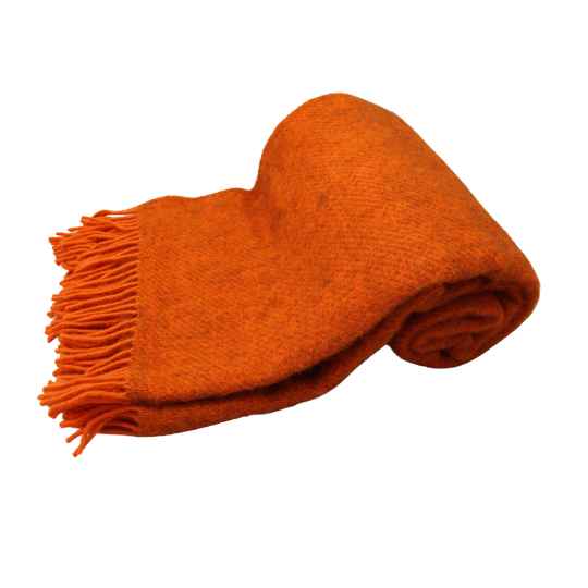 Orange Gotland ool Throw rolled up