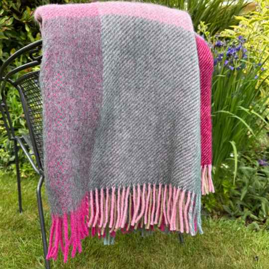 Gotland pink check wool throw on a chair 