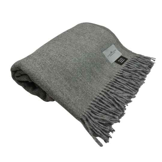 grey herringbone wool throw rolled up