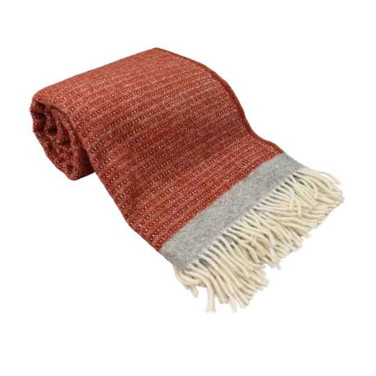 Harald Rust Eco lambswool throw rolled up