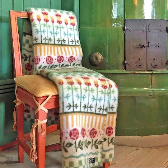 karin lambswool blanket on a chair