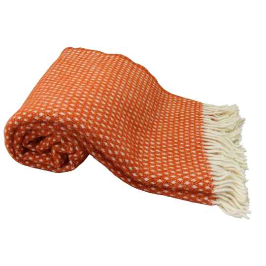 Knut Orange lambswool throw rolled up