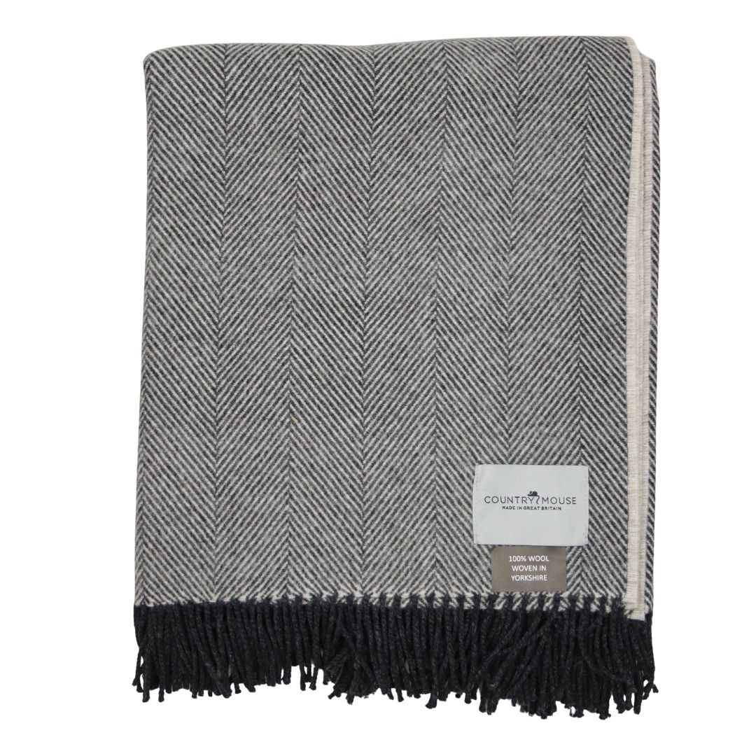 grey wool throw with a country mouse woven label