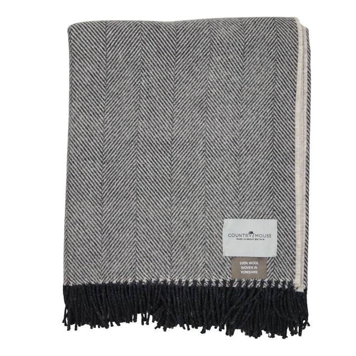 grey wool throw with a country mouse woven label
