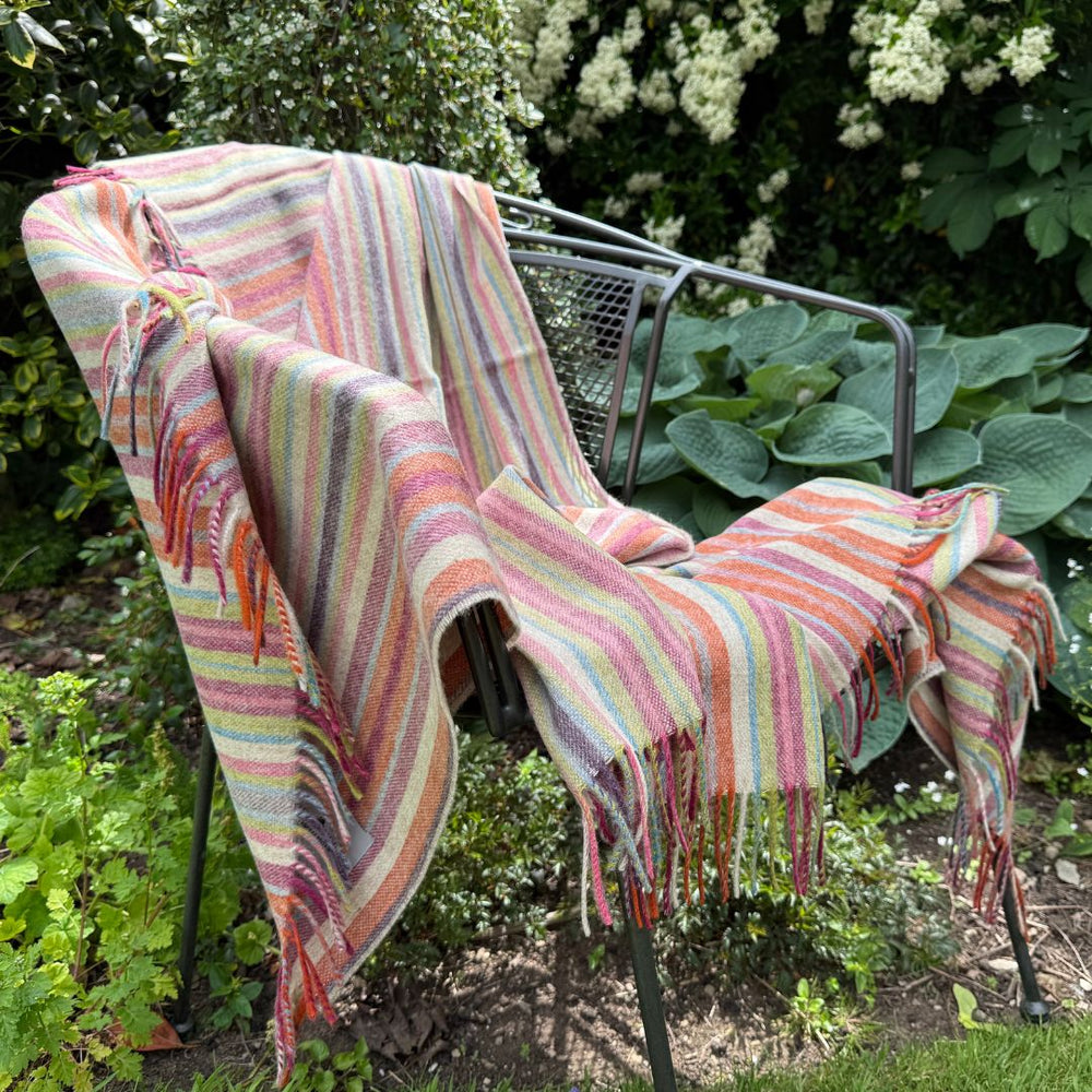 santa cruz merino lambswool blanket on a chair