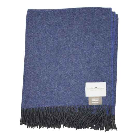 smoked indigo wool throw with a woven country mouse label on a whire background