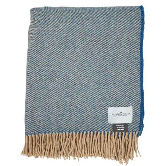 teal and oat wool throw on a white background