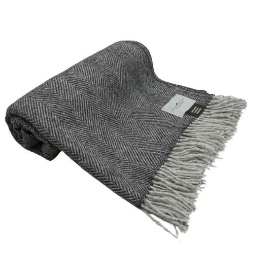 charcoal herringbone wool throw rolled up