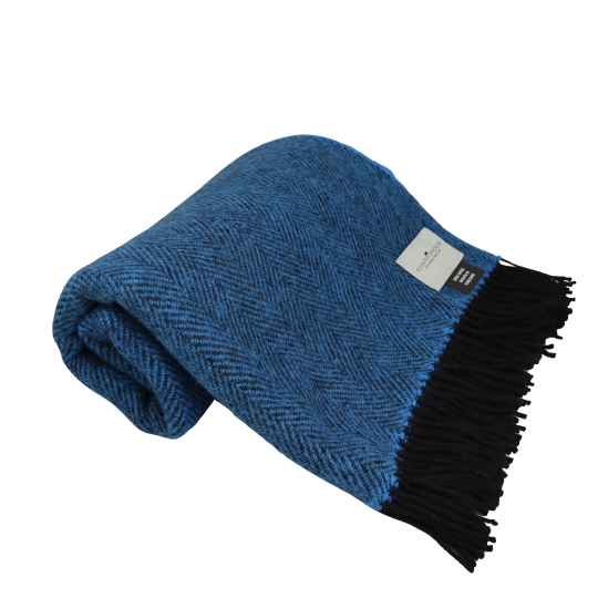 Blue blanket with black fringe on a white background