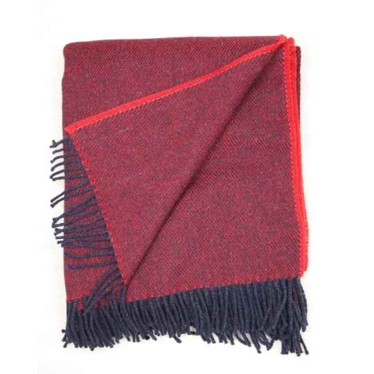 red wool throw on a white background