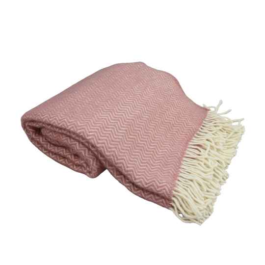Powder Pink sorbet wool  blanket with white fringe on a white background
